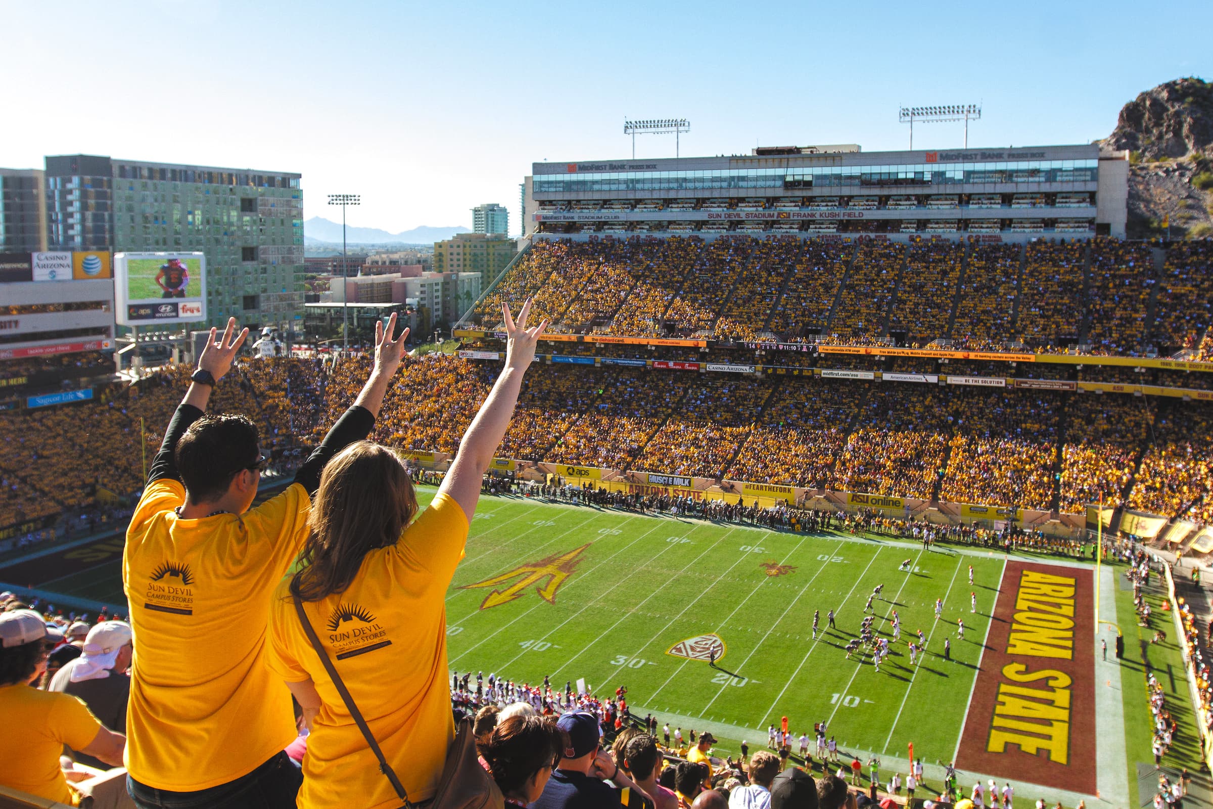 Fans cheering at ASU football game